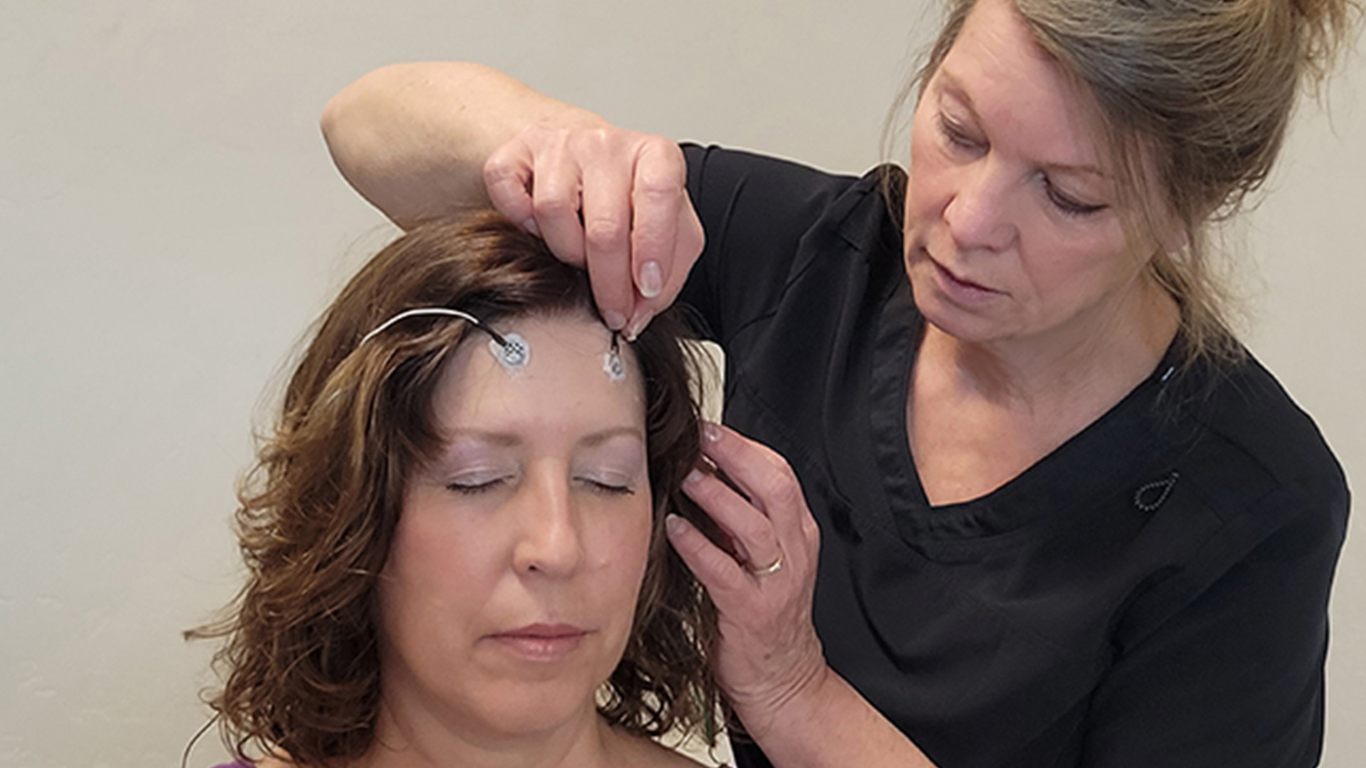 Client receiving MCN brain retraining at Brain & Bio Gym Rifle CO