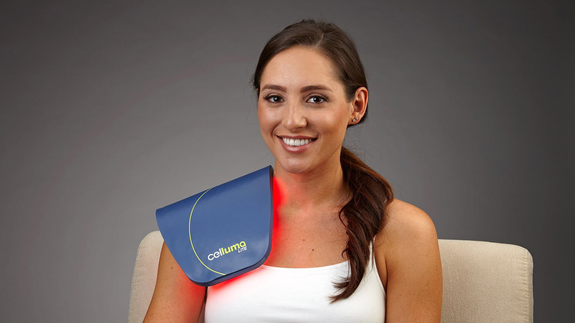 Client receiving Celluma light therapy for pain relief and nervous system wellness at Brain & Bio Gym in Rifle, CO